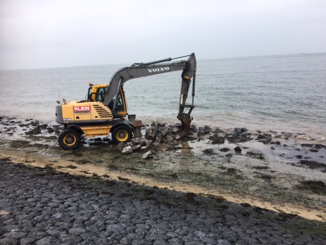 Aanbrengen bestorting en gietasfalt  Helderse Zeewering