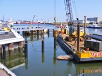 Aanleg vislossteigers en beschermpalen Nieuwe Haven Den Helder